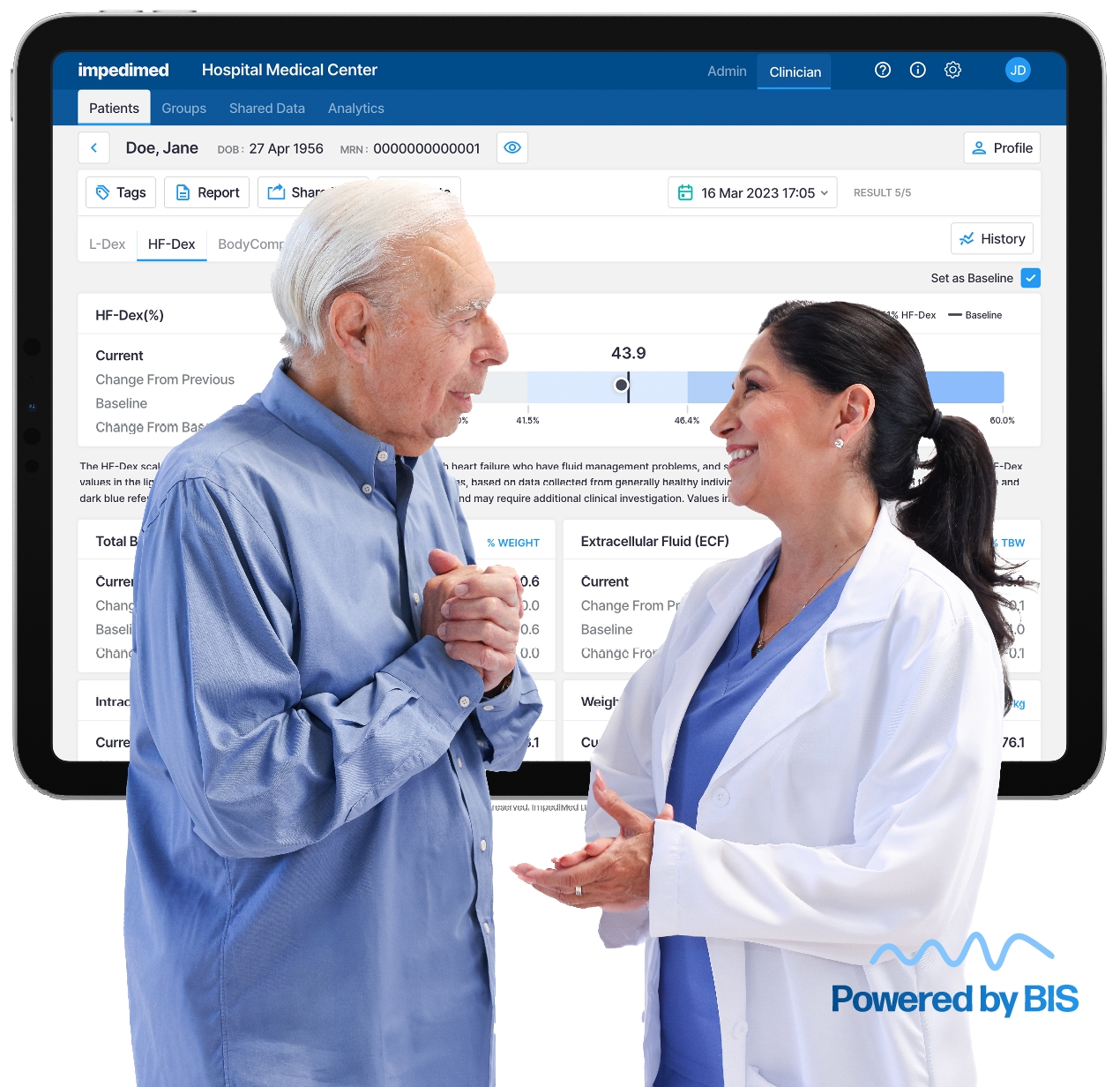 Elderly patient with his physician in front of a chart